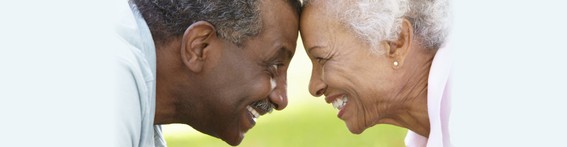 portrait of romantic senior african american couple In park