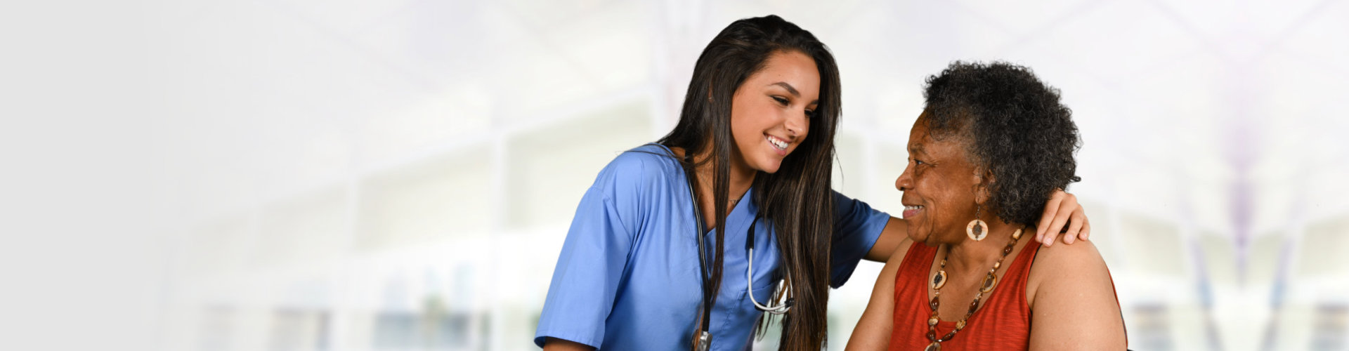 Health Care Worker and Elderly Woman