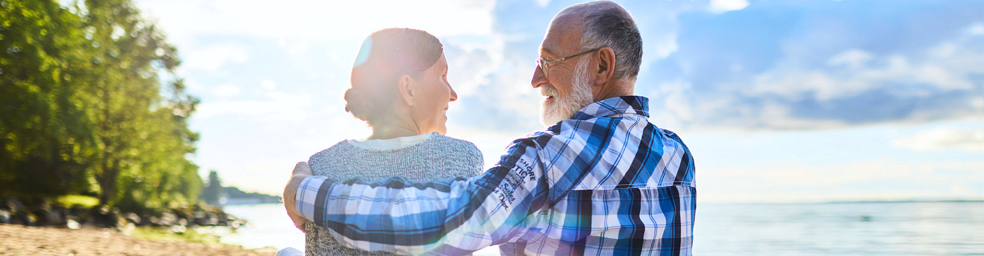 senior couple beside seashore